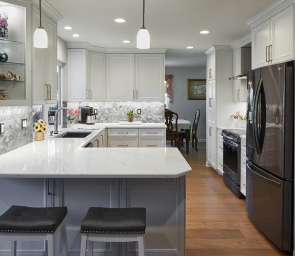 newly remodeled kitchen with white granite countertops